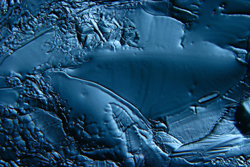 abstract blue background cold ice texture with cracks