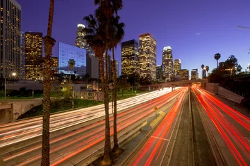 Gordijnen Los Angeles downtown buildings and highway traffic at night © blvdone