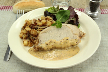 rôti de porc et pommes de terre