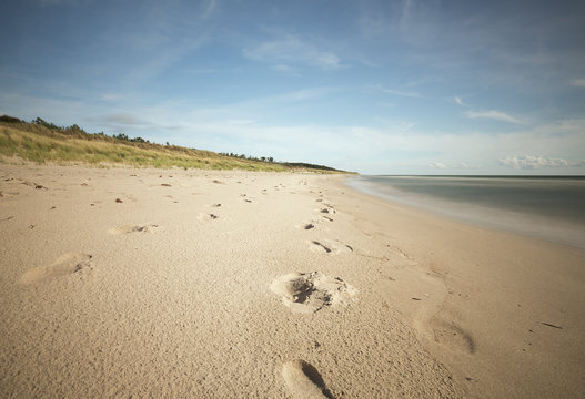 Beach with footprints in the sand