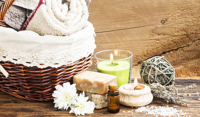 Spa and Wellness Setting with Towels,Candle, Natural Soap and Es