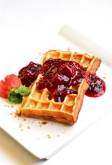 Waffles with berries. Selective focus