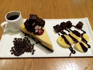 Brownie Cheesecake with Banana pieces and Hot Chocolate