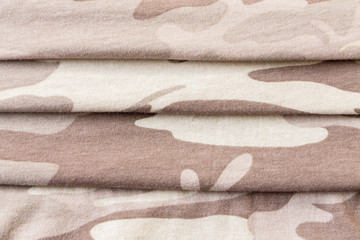 Fototapeta na wymiar Close up camouflage fabric texture background