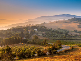 Tuscan Village during Foggy Sunrise