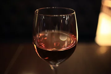 Fotobehang glass of wine restaurant interior serving dinner © kichigin19