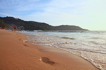 drawing on the sand sea surf
