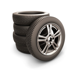 Stack of car tires and car wheel