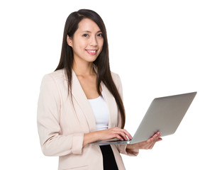 Businesswoman use of laptop