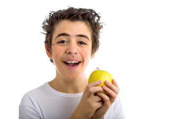 smiling child holding a yellow apple
