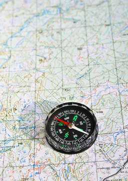 The magnetic compass and topographic map. © sergunt