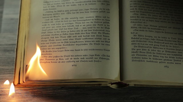 Burning antique book