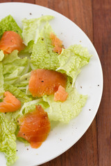 salad with smoked salmon on plate