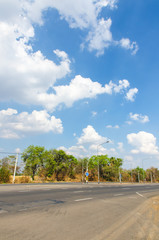 Fototapeta premium The road with cloud and blue sky