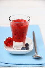 Red currant, raspberry, blueberry smoothie, soft focus