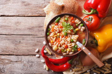 minestrone soup and ingredients. horizontal top view