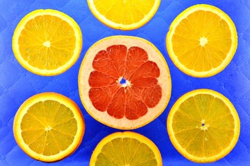 Fototapeta na wymiar Background of different kinds citrus fruits