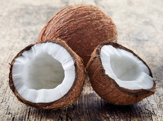closeup of coconut on old wooden table