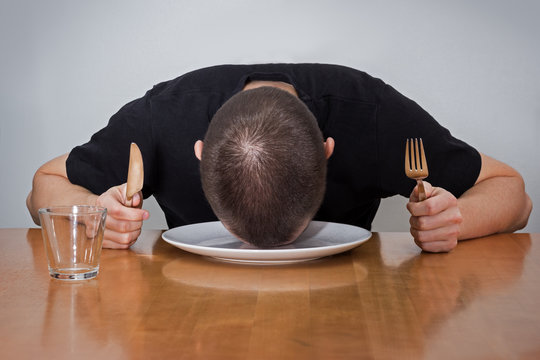 Man Sleeping Head On A Plate, Tired Of Waiting For Food