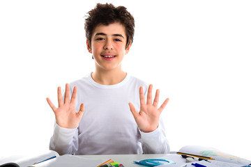 teenager boy on homework blank book smiling and showing number 1