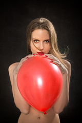 woman with red balloon