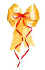 golden bow with red ribbon made from silk