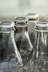 Clear glass bottles in the sun