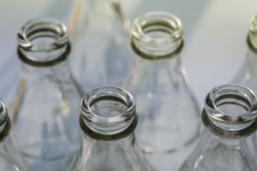 Clear glass bottles in the sun