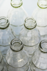 Clear glass bottles in the sun