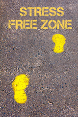 Yellow footsteps on sidewalk towards Stress Free Zone message