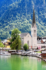 Fototapeta premium Hallstatt village in Alps at misty day, Austria