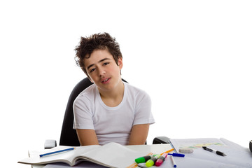 Fototapeta na wymiar Tired boy doing homework