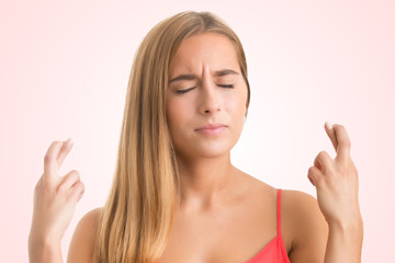 Woman Crossing Her Fingers For Good Luck