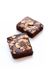 Chocolate brownie portions with almond slice