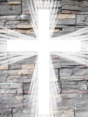 white cross with light rays and stone background