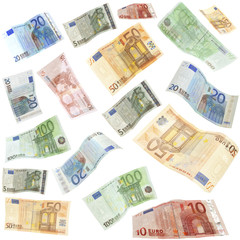 Flying Euro banknotes isolated on white