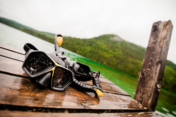 Snorkeling Mask and Tuba on Dock