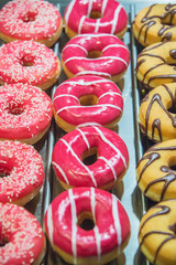 Sweet donuts arranged at display