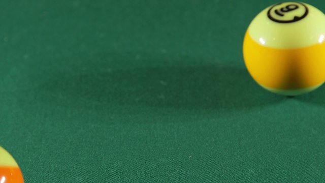 Playing billiard game on pool table