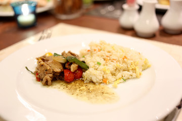 Fried rice in white dish.