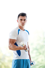 Fototapeta premium man exercise with weights
