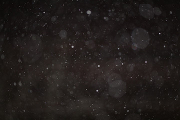 texture of white rain drops on a black background 