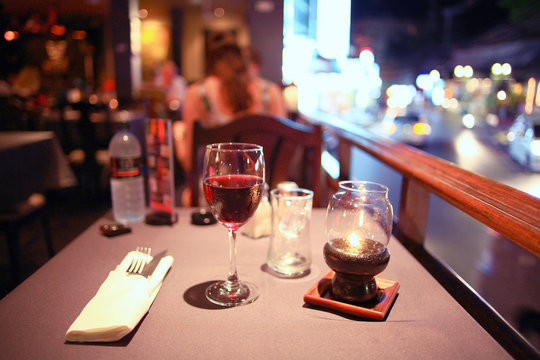 glass of wine restaurant interior serving dinner