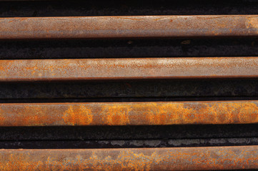 red and brown rusted railway steel.