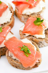 Bread with salmon, close up view