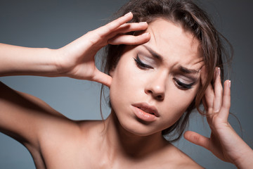 Naklejka premium the woman with a headache