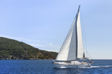 Fototapeta na wymiar Sailboat cruise on the Mediterranean sea. Sailing.