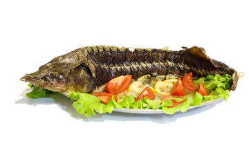 Hot smoked sturgeon on the dish