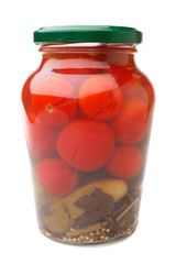 Tomatoes and cucumbers canned in glass jar