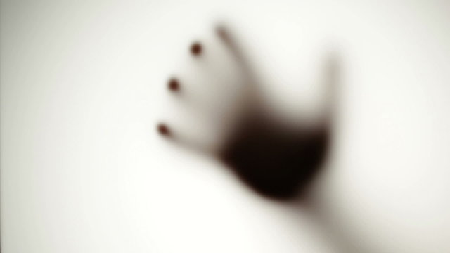 Spooky Defocused Hand - Behind Frosted Glass